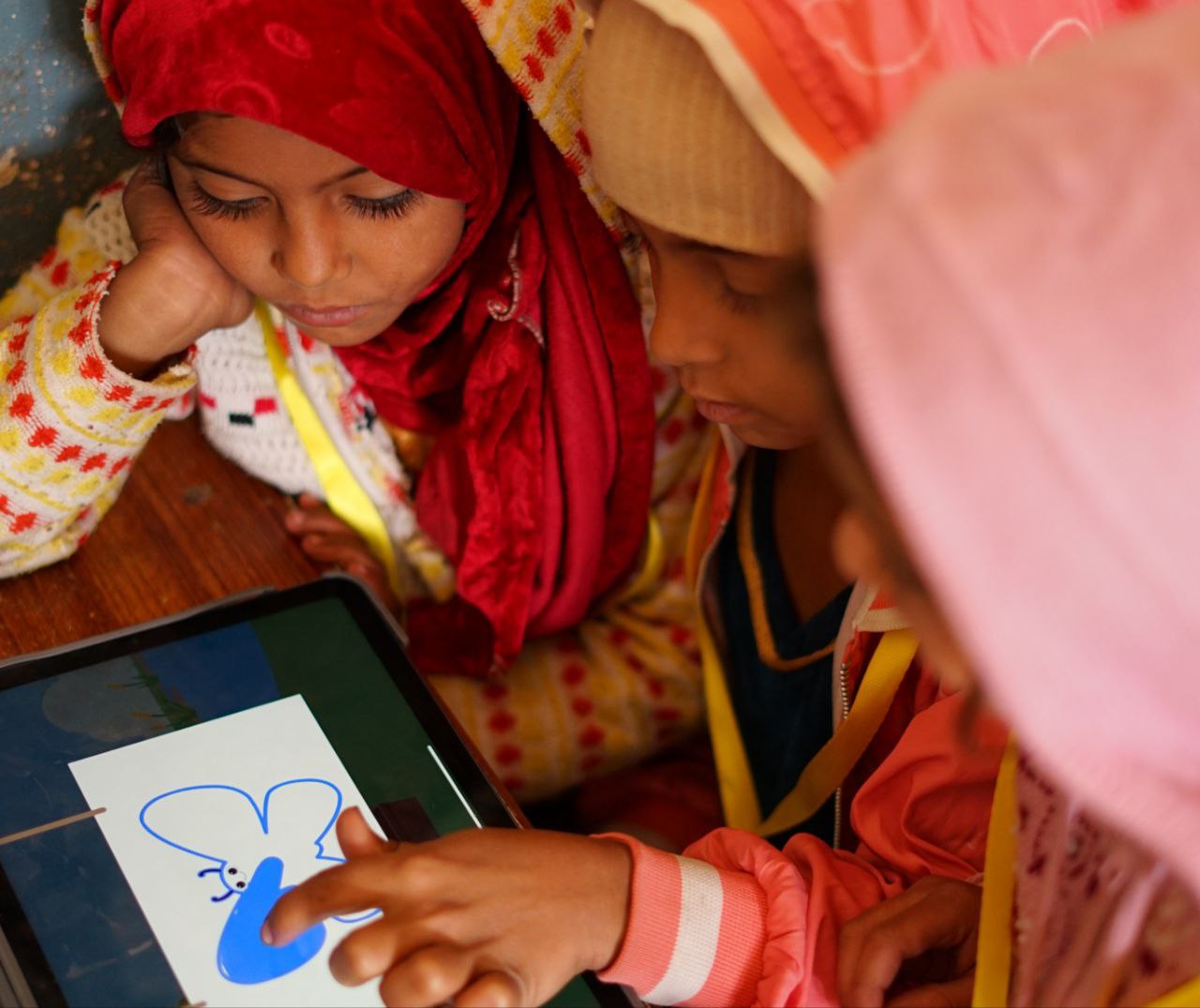 Child learning with a phone